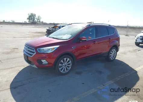 2017 Ford Escape Titanium z USA, uszkodzony, nr VIN 1FMCU9J93HUA50331